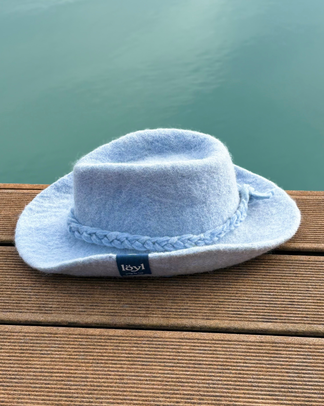 blue cowboy sauna hat from the left