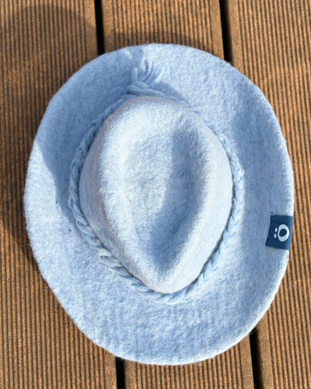 top-down view of the blue wool felt cowboy sauna hat