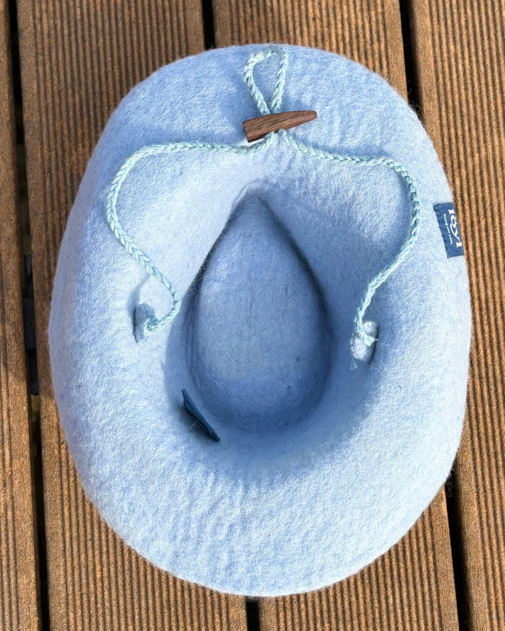 underside of the blue wool felt cowboy sauna hat