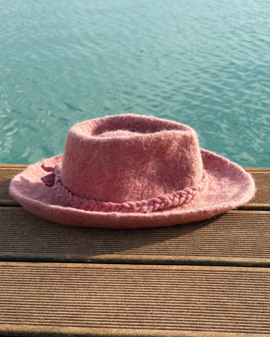pink cowboy sauna hat from the right